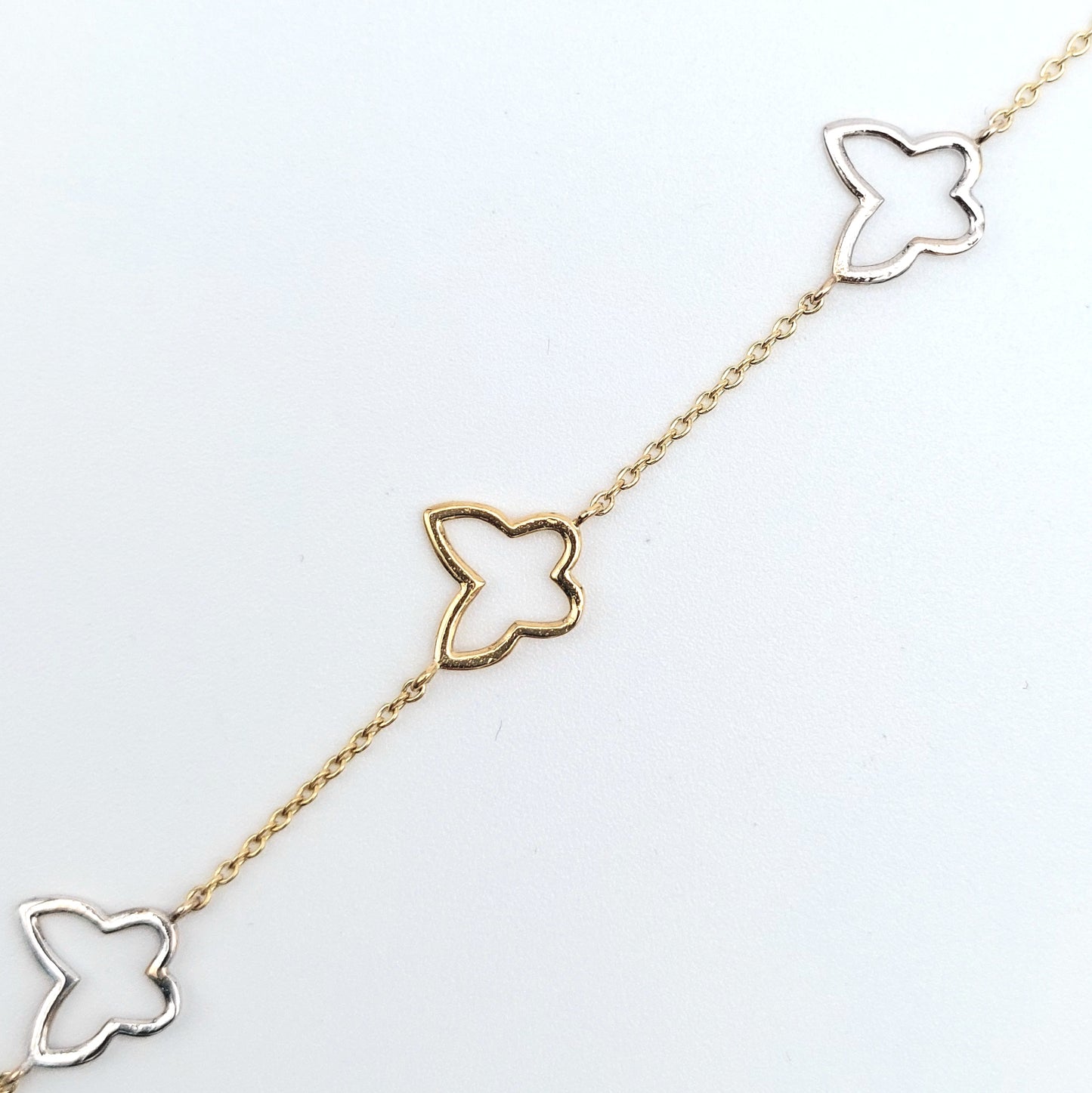 Bracciale Donna con elementi microfusi in oro giallo e oro bianco 18 KT.BR-D-ORO027.