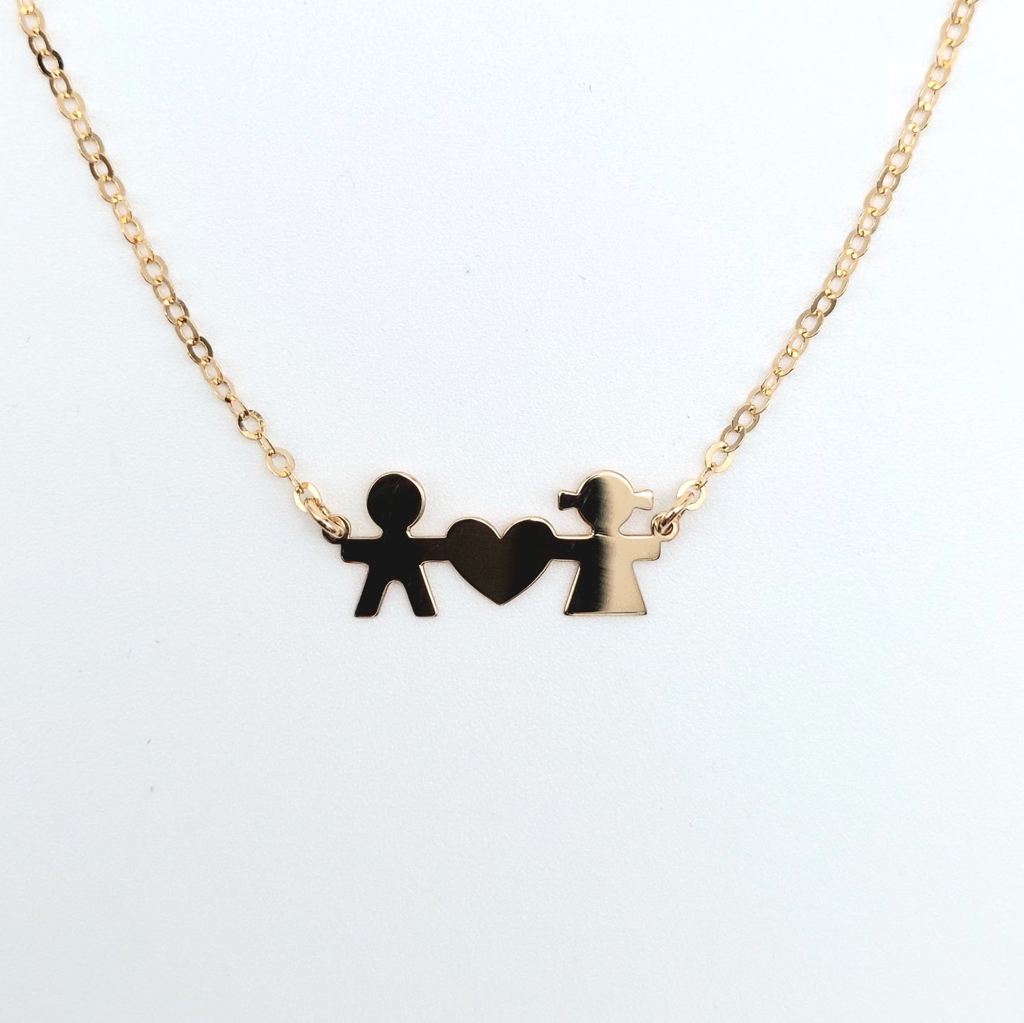 Collana in oro giallo 18 KT , con bimbo, bimba e cuore. COL-D-ORO030.