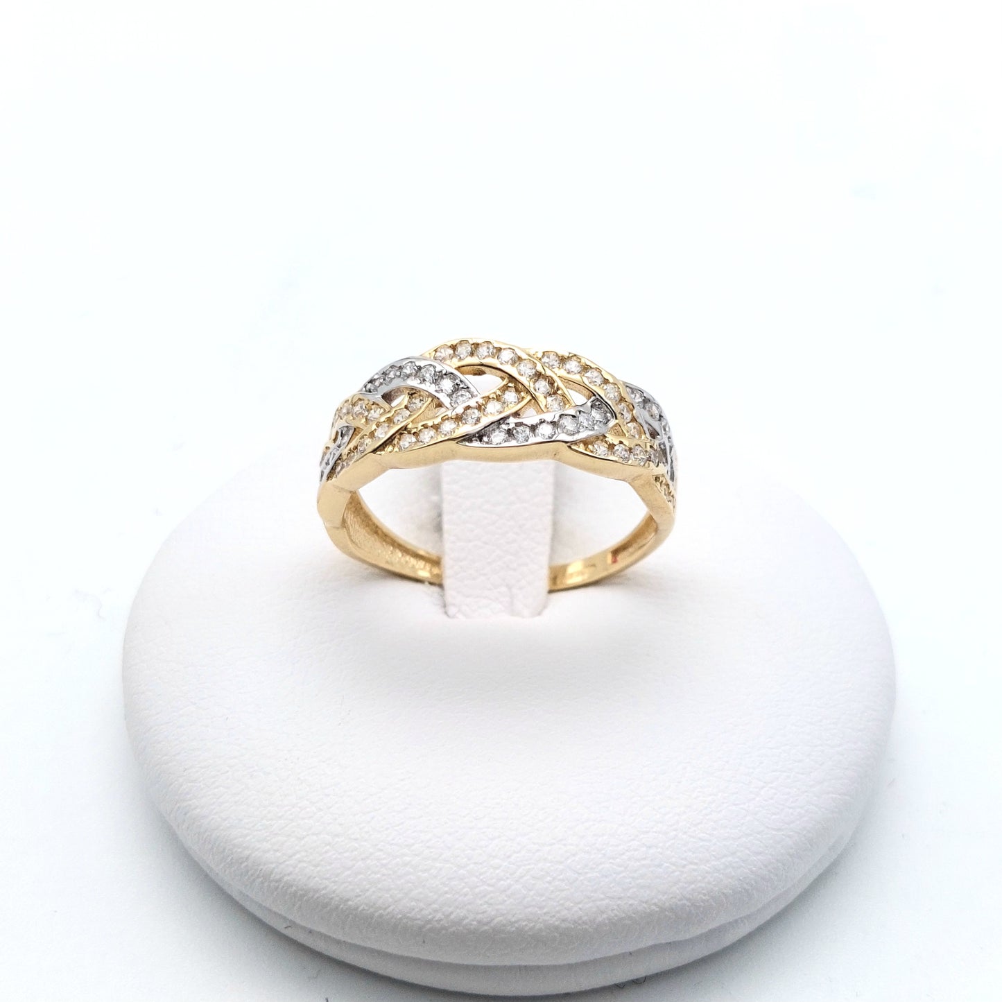 Anello in oro giallo e bianco 18 KT con zirconi bianchi. AN-ORO082.