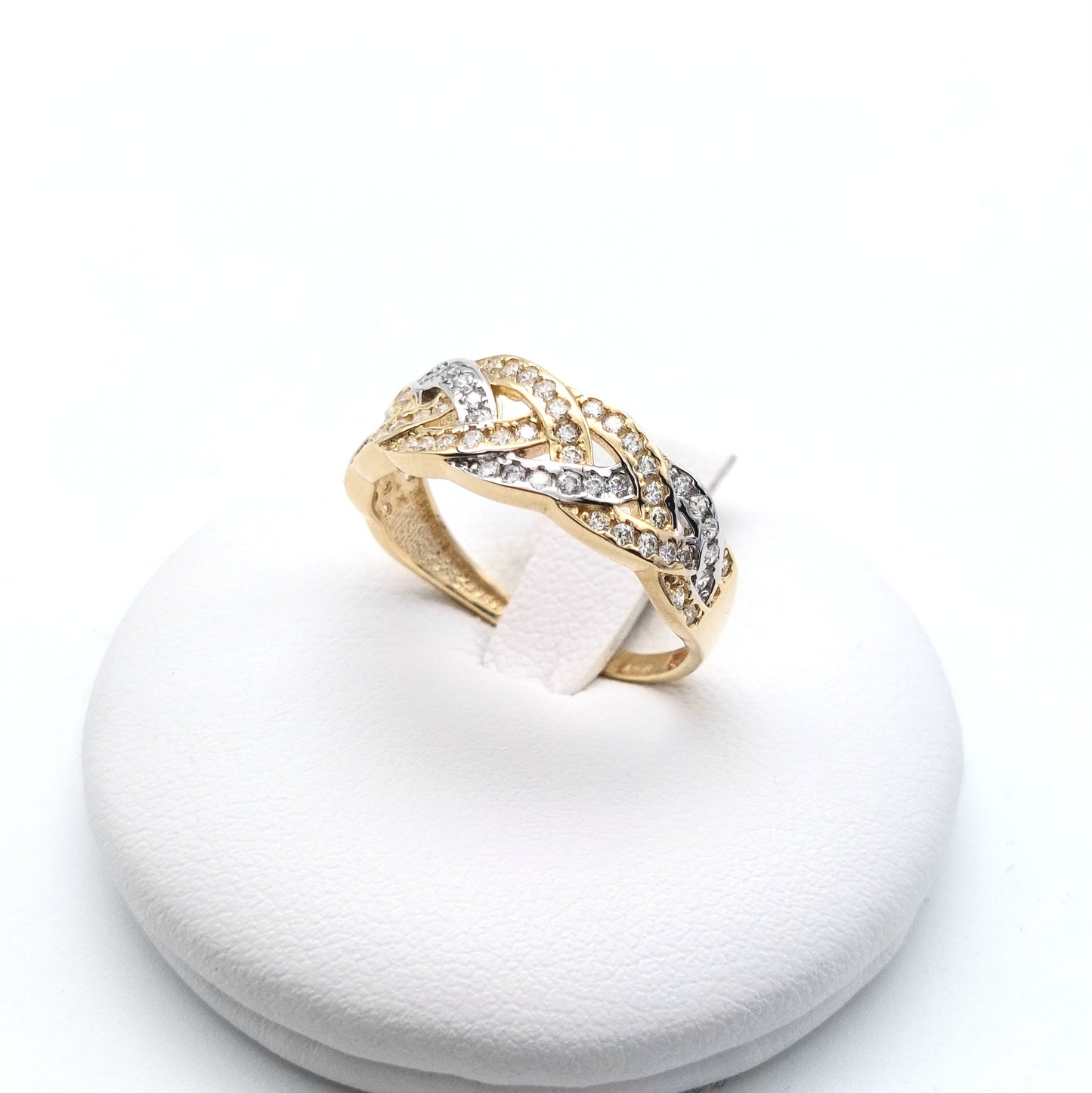 Anello in oro giallo e bianco 18 KT con zirconi bianchi. AN-ORO082.
