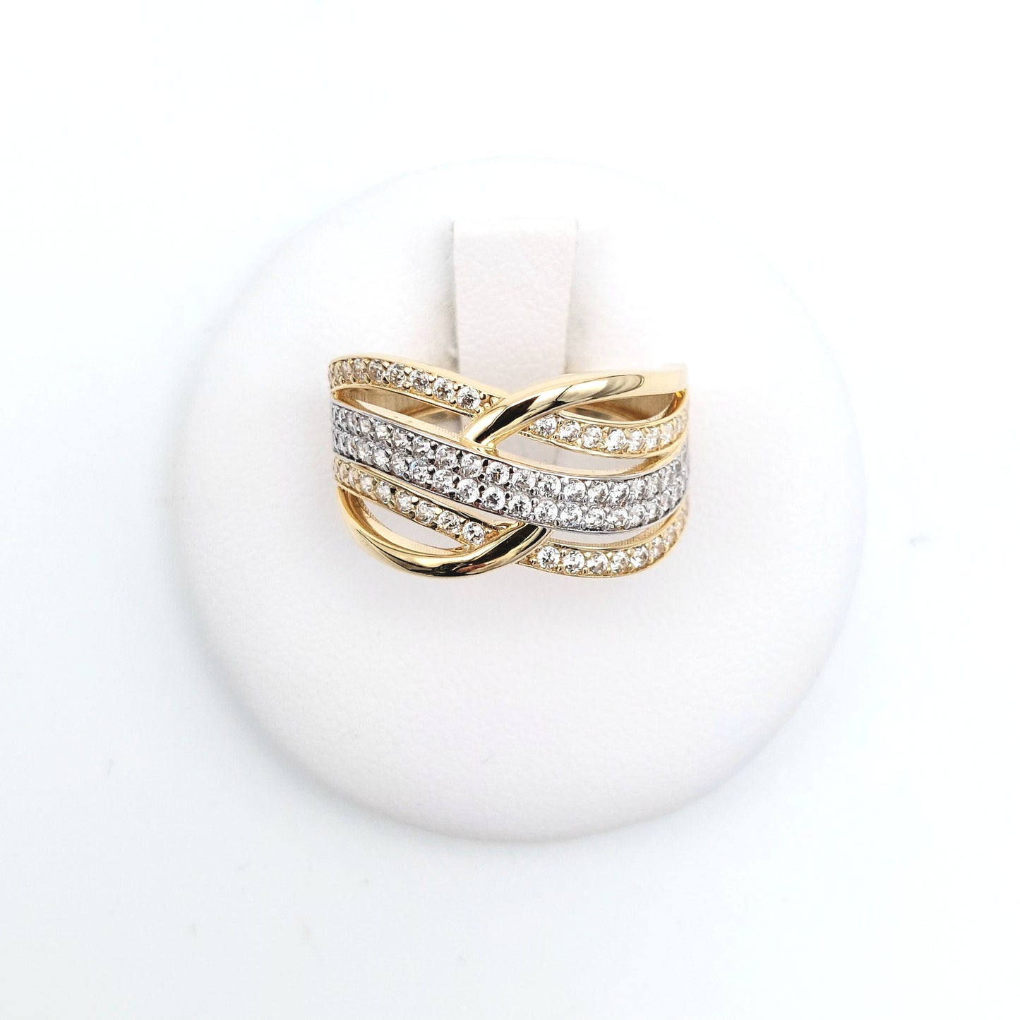 Anello in oro giallo e bianco 18 KT con zirconi bianchi. AN-ORO079.
