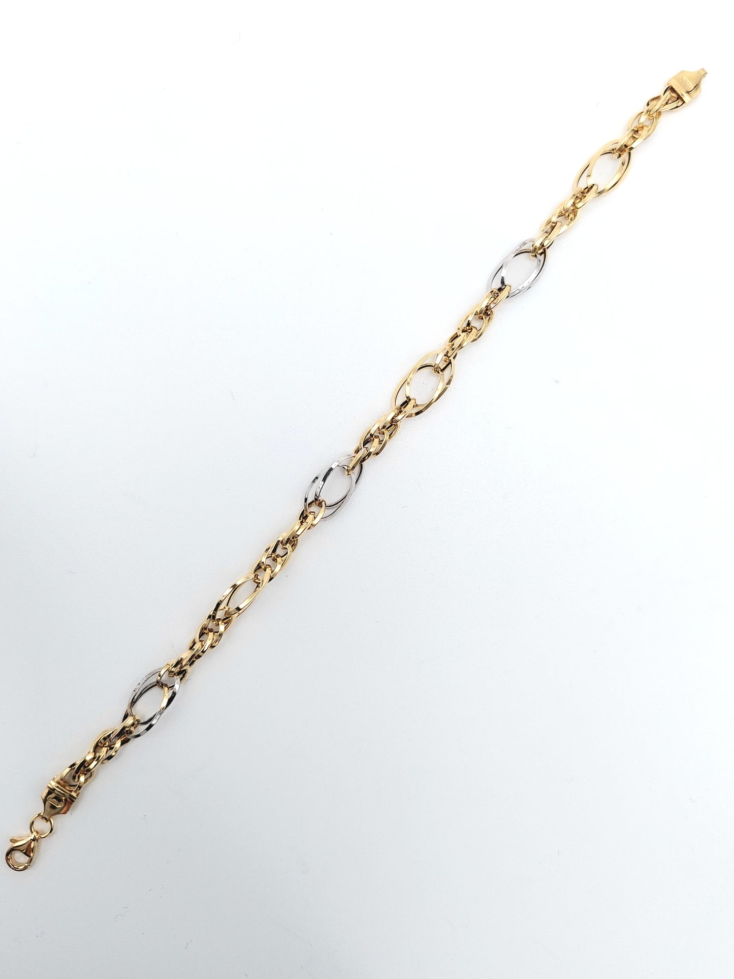 Bracciale da donna a catena in oro giallo e bianco 18 KT. BR-D-ORO040.