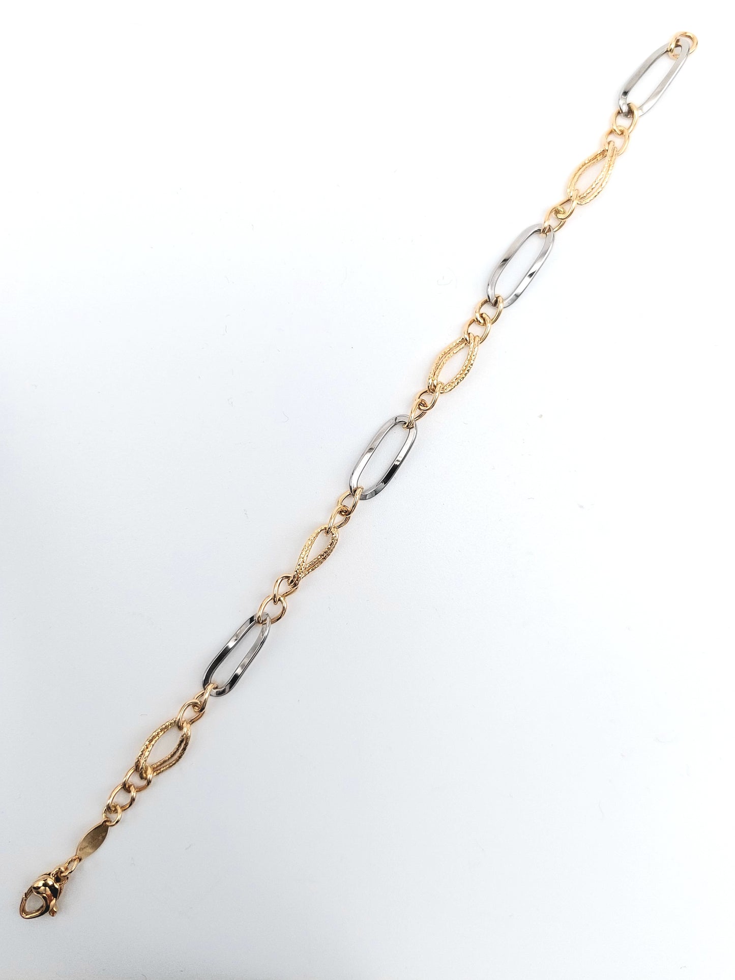 Bracciale a catena da donna in oro giallo e bianco 18 KT.BR-D-ORO052.
