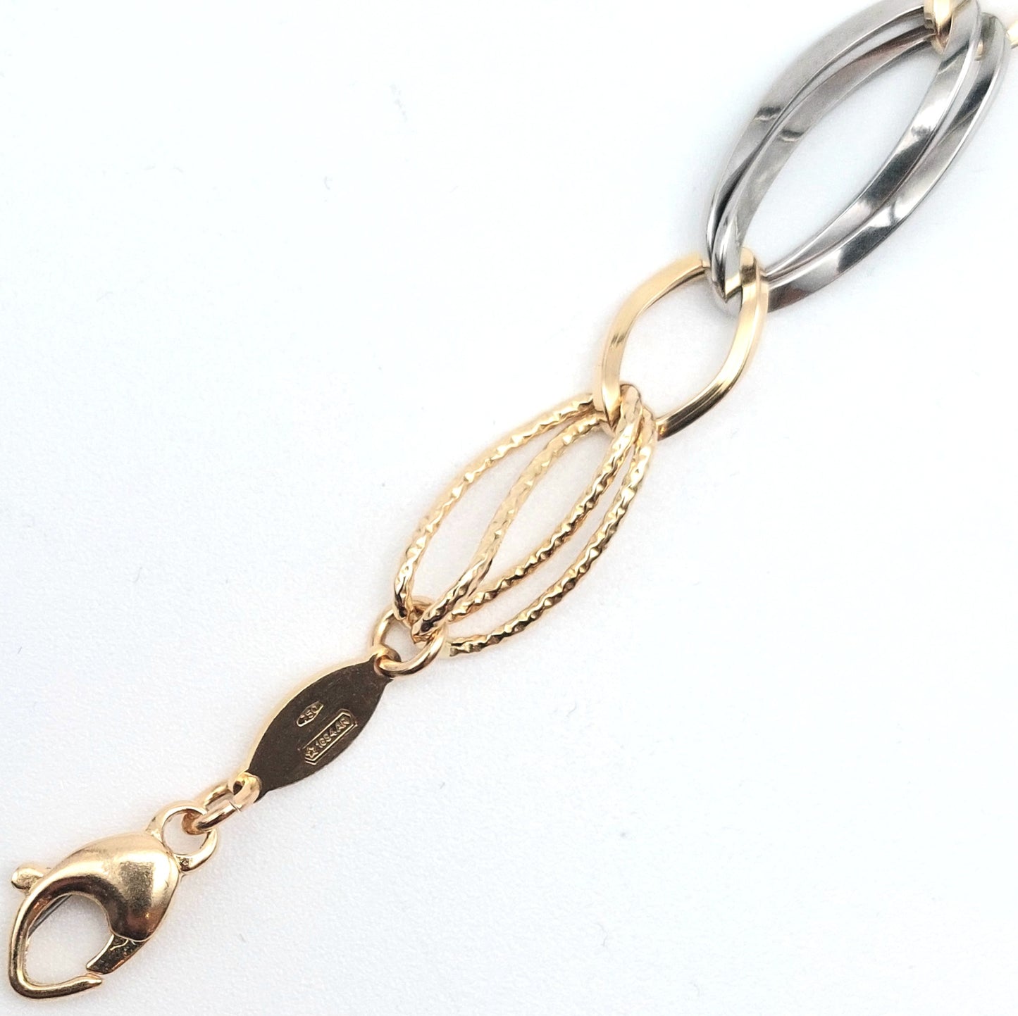 Bracciale a catena da donna in oro giallo e bianco 18 KT. BR-D-ORO057.