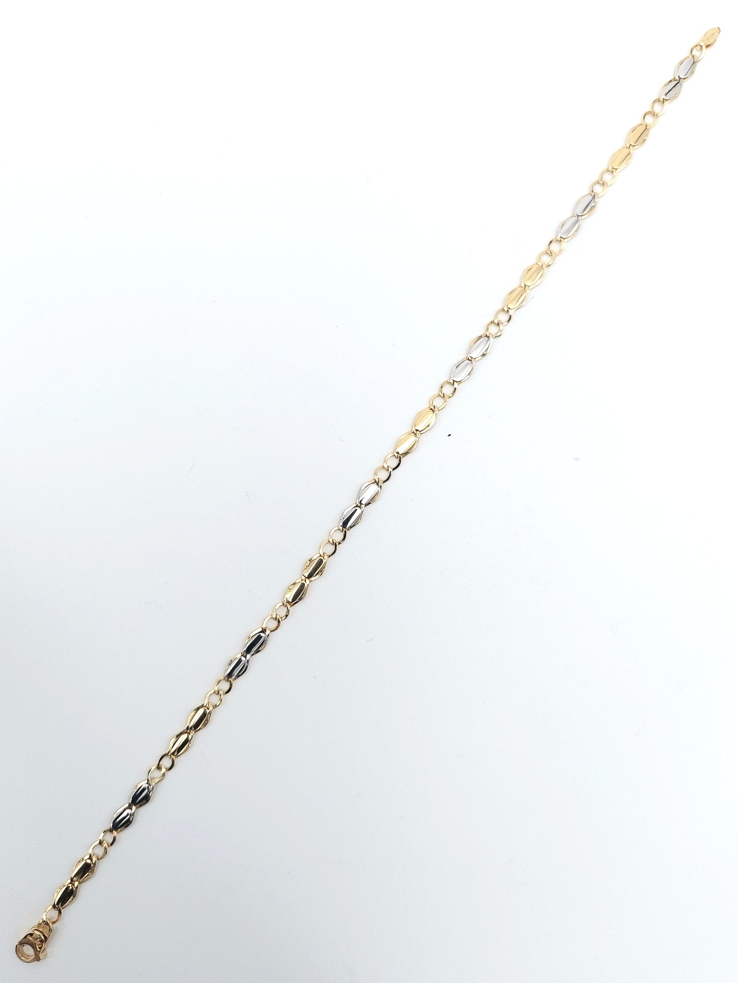 Bracciale da uomo in oro giallo e bianco 18 kt. BR-U-ORO007.