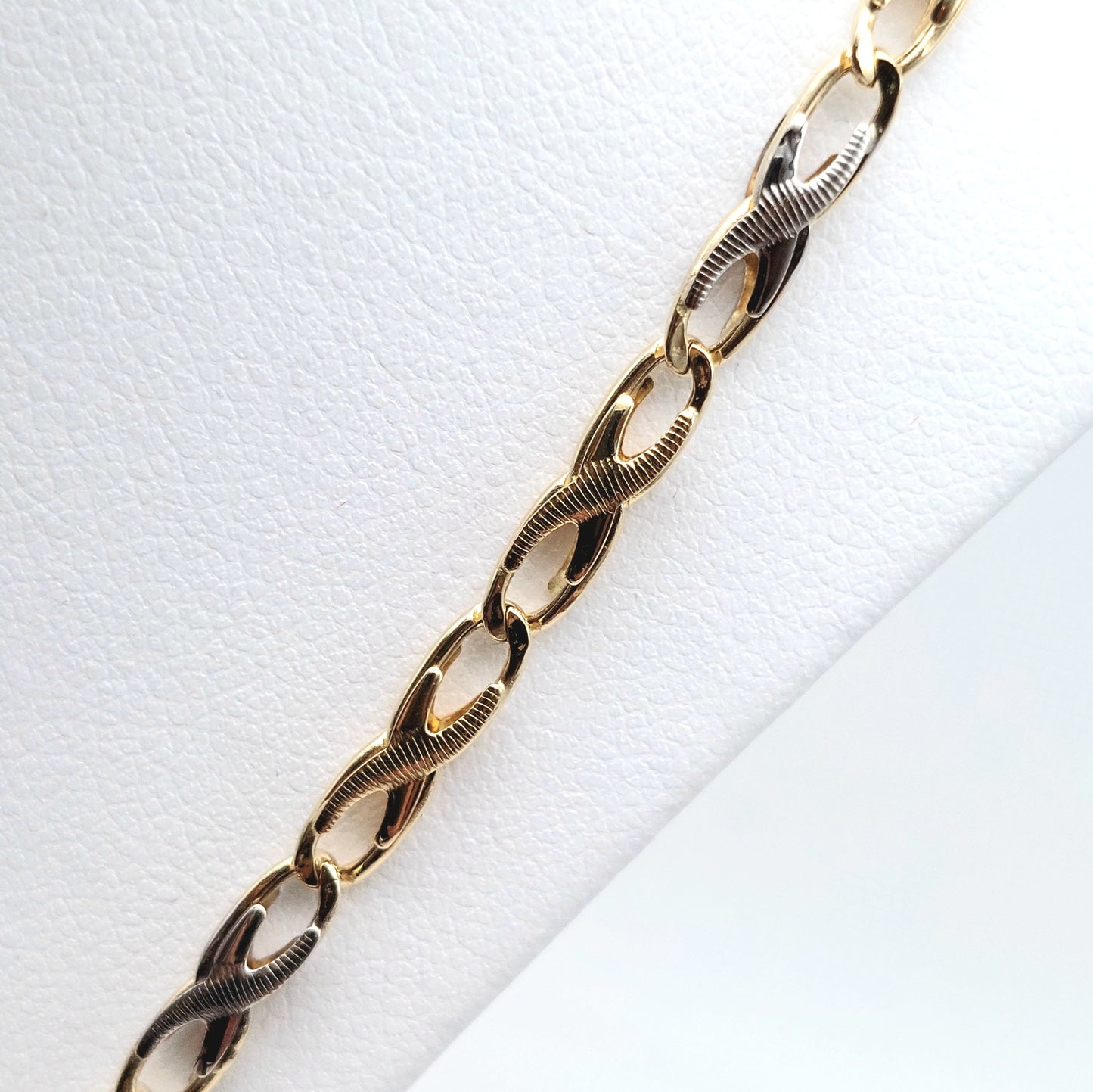 Collana a catena da uomo in oro giallo e bianco 18 KT . COL-U-ORO007.