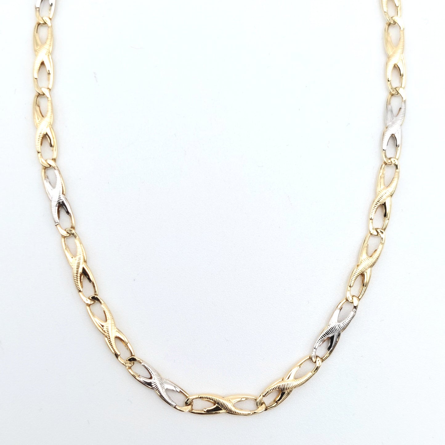 Collana a catena da uomo in oro giallo e bianco 18 KT . COL-U-ORO007.