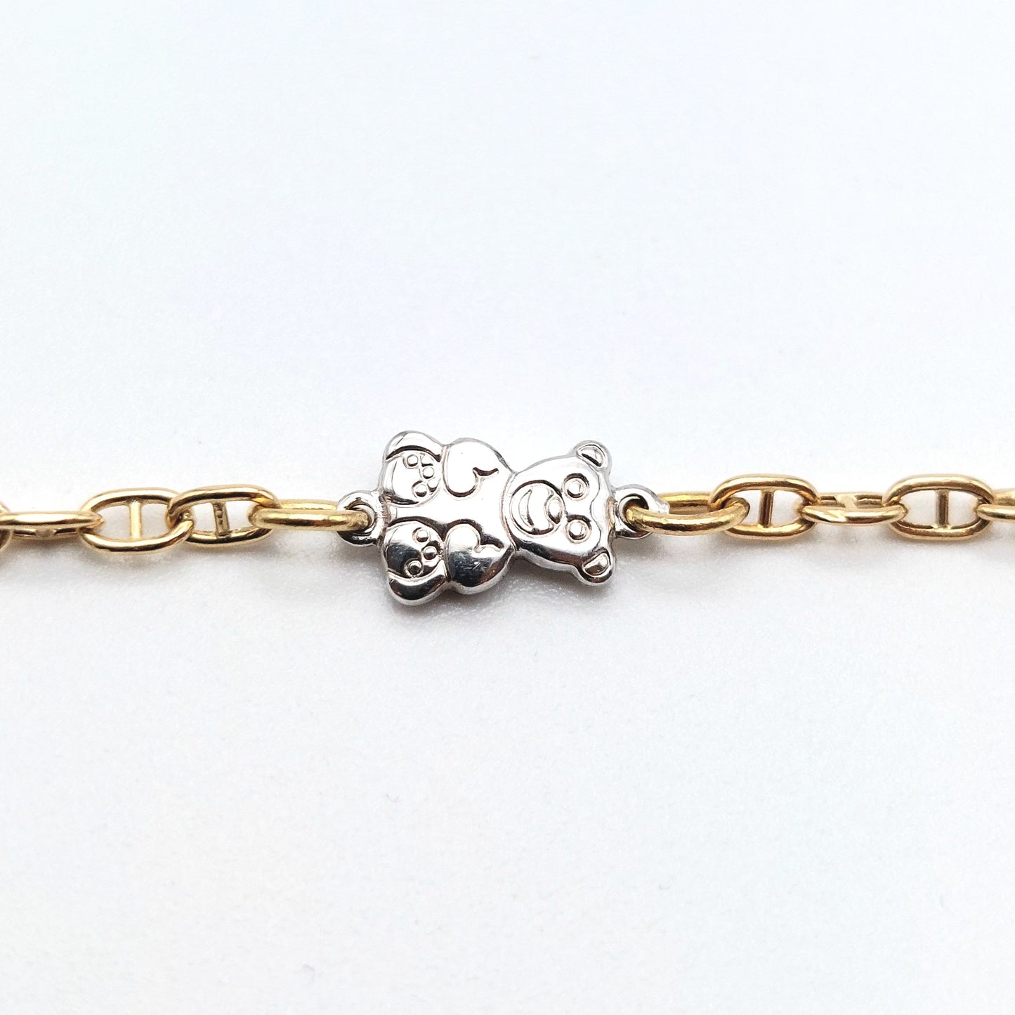Bracciale baby in oro giallo e bianco 18 kt. BR-B-ORO009.