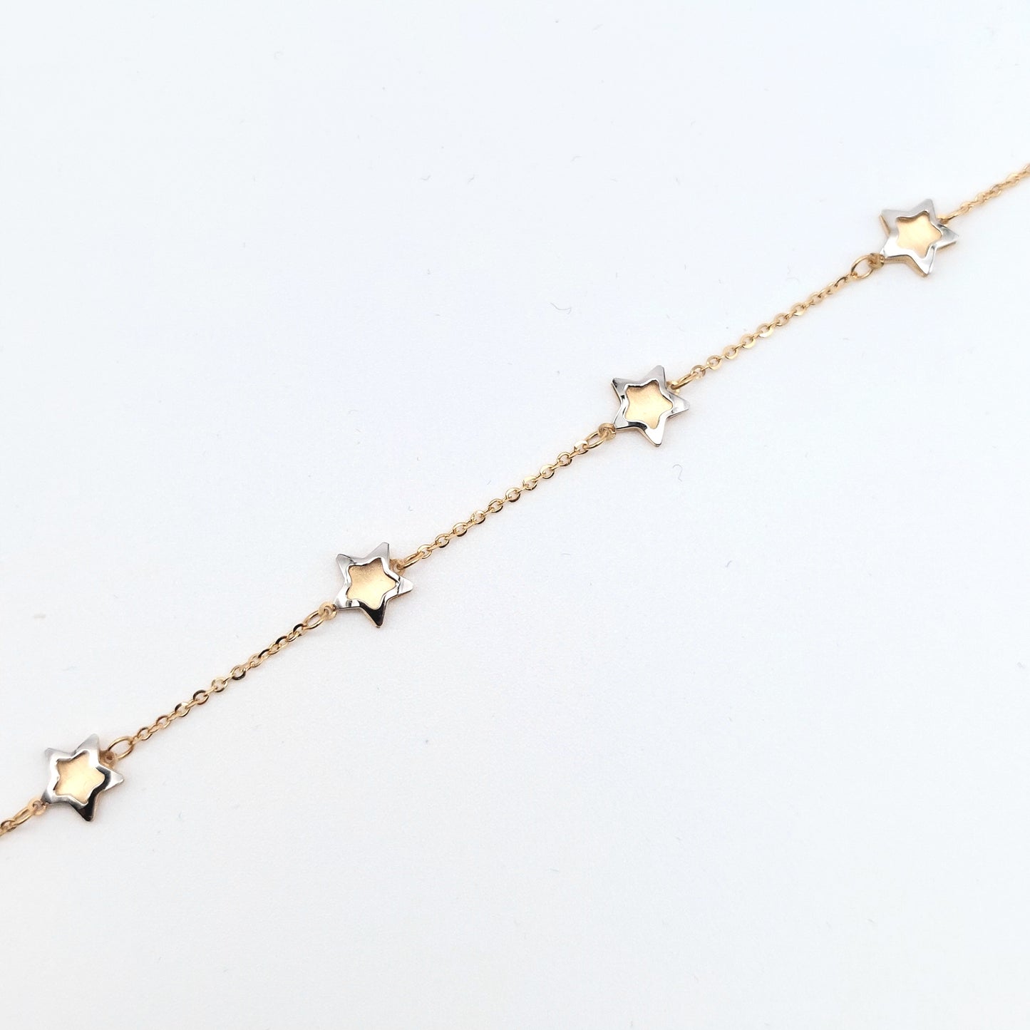 Bracciale da donna in oro giallo e bianco 18 kt. BR-D-ORO011.