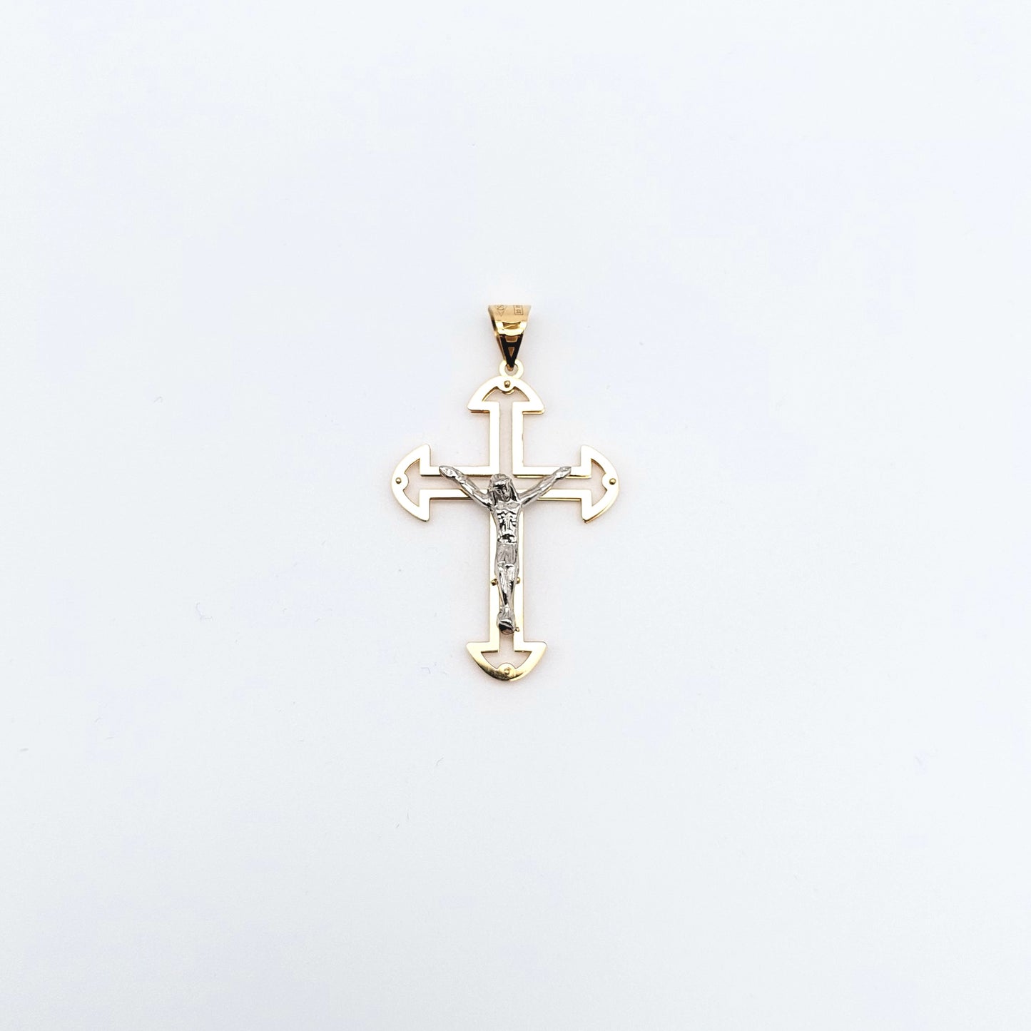 Croce in oro giallo e bianco 18 kt. CR-ORO005.