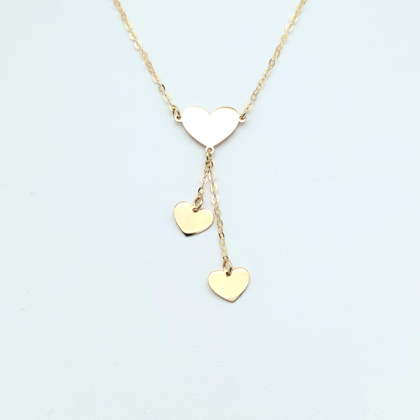 Collana a catena con centrale e pendenti a cuore in oro giallo 18 KT cm 45. COL-D-ORO006.