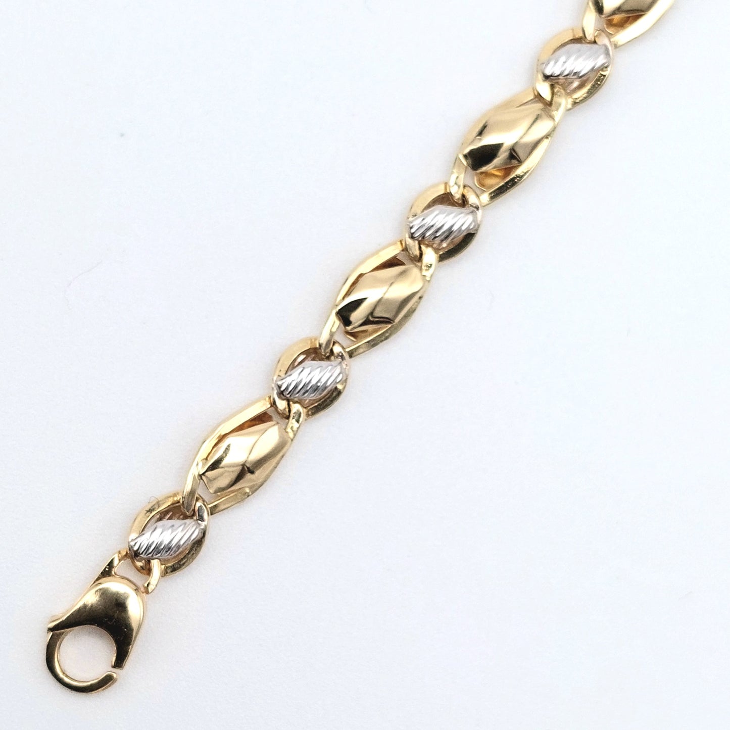 Bracciale uomo in oro giallo e bianco 18 kt. BR-U-ORO001.