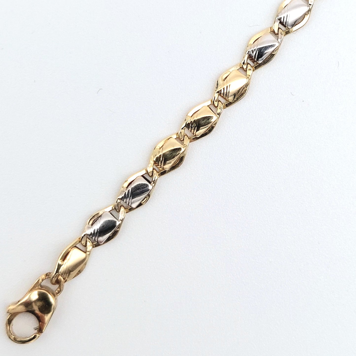 Bracciale da uomo in oro giallo e bianco 18 kt. BR-U-ORO003.