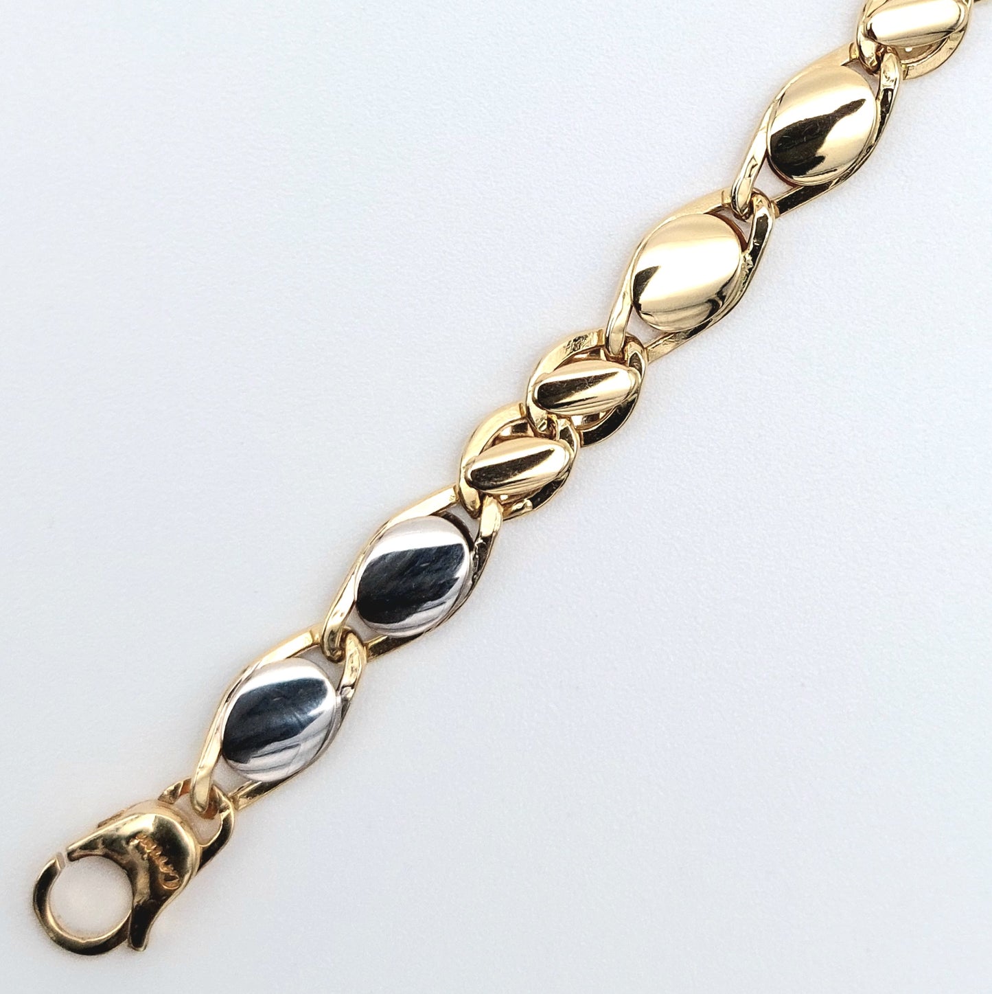 Bracciale da uomo in oro giallo e bianco 18 kt. BR-U-ORO005.