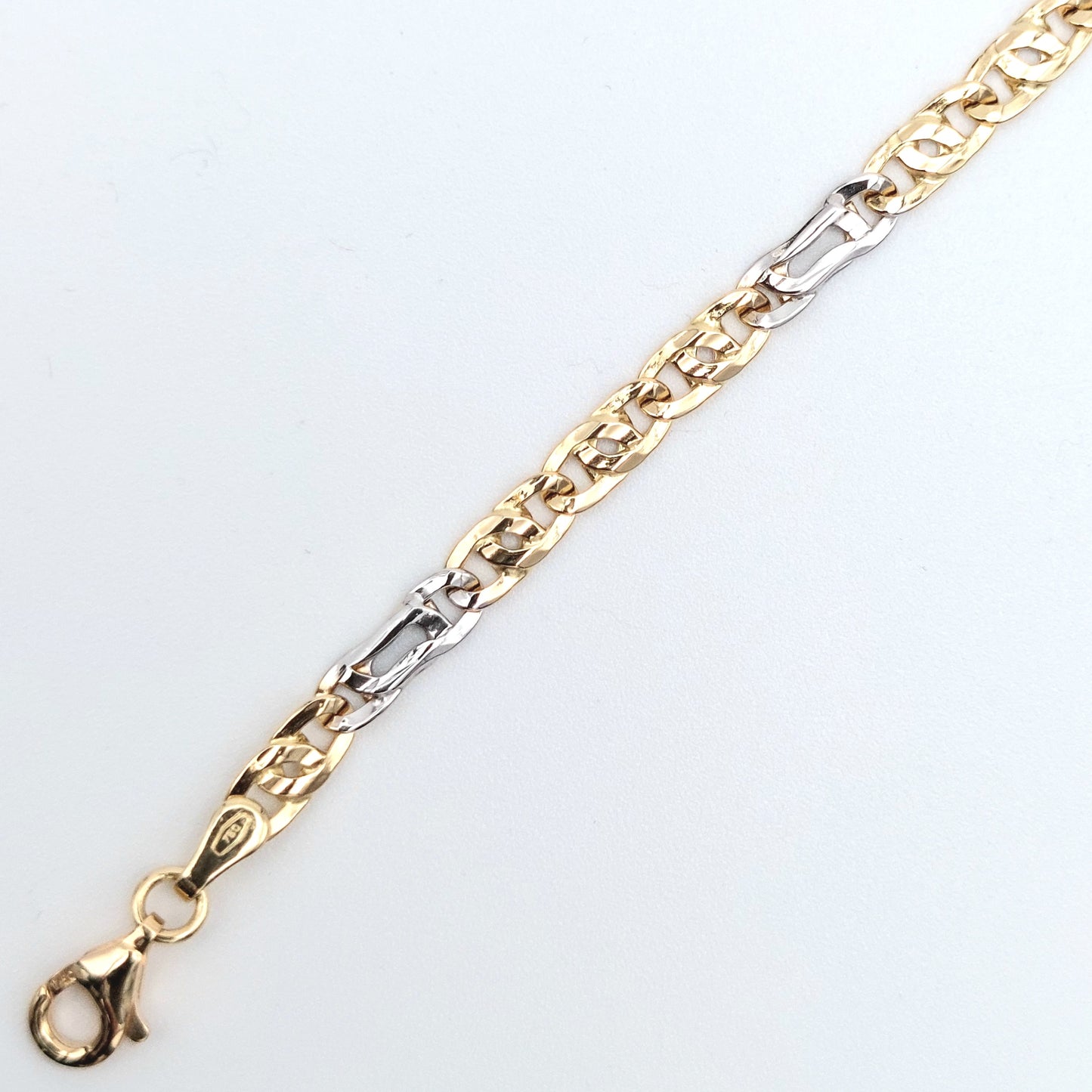 Bracciale da uomo in oro giallo e bianco 18 kt. BR-U-ORO006.