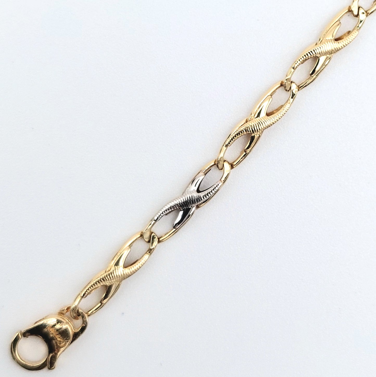 Bracciale da uomo in oro giallo e bianco 18 kt. BR-U-ORO010.