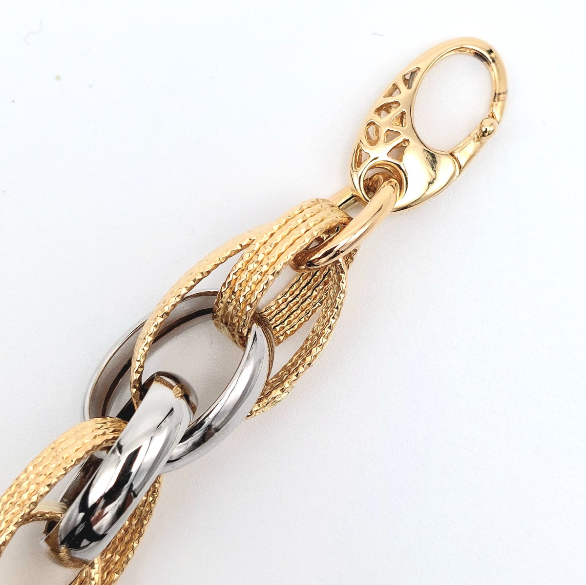 Bracciale a catena da donna in oro giallo e bianco 18 kt. BR-D-ORO023.