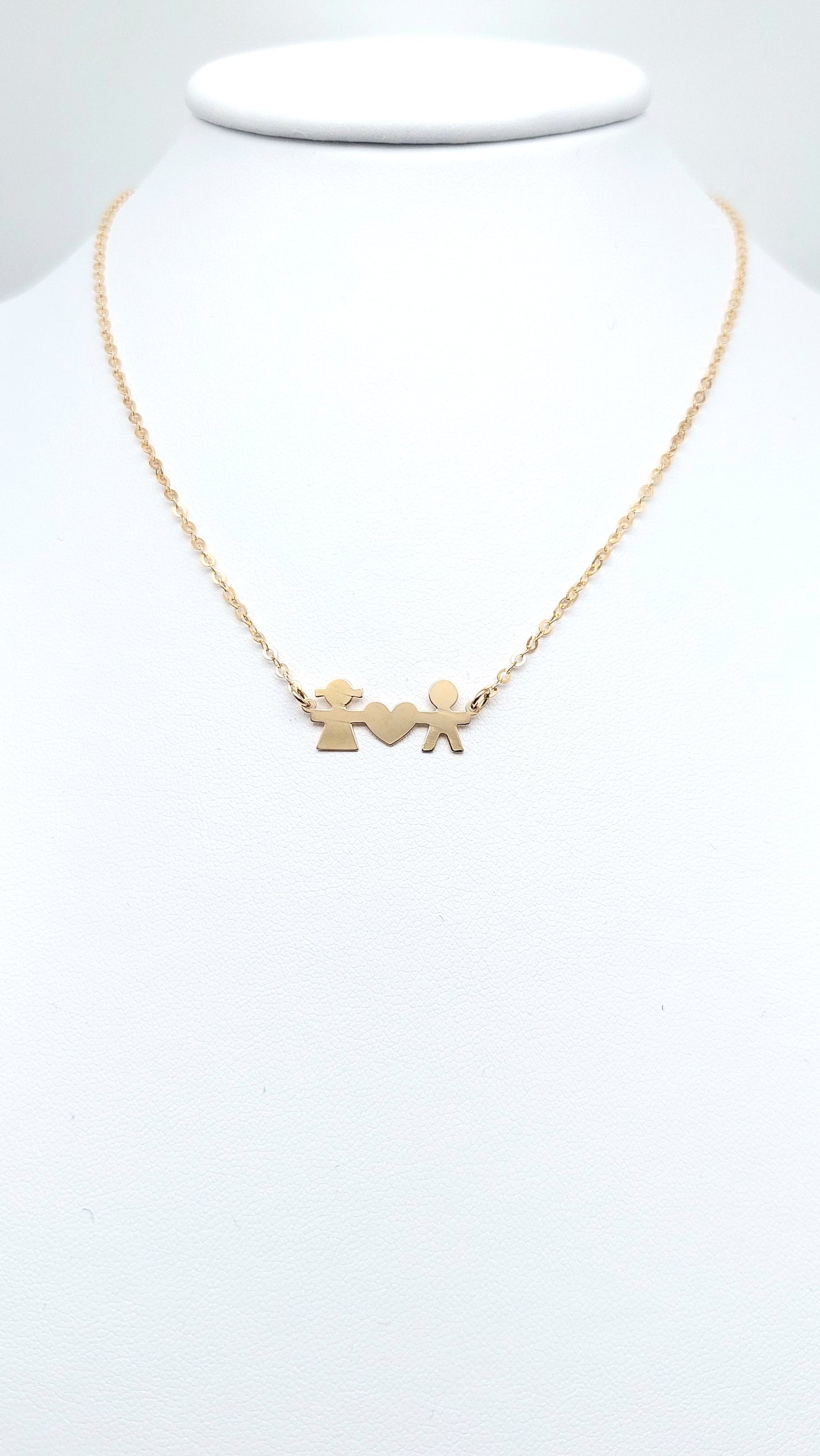 Collana in oro giallo 18 KT , con bimbo, bimba e cuore. COL-D-ORO030.