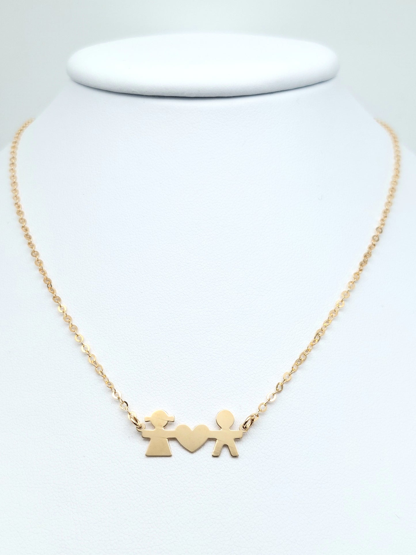 Collana in oro giallo 18 KT , con bimbo, bimba e cuore. COL-D-ORO030.