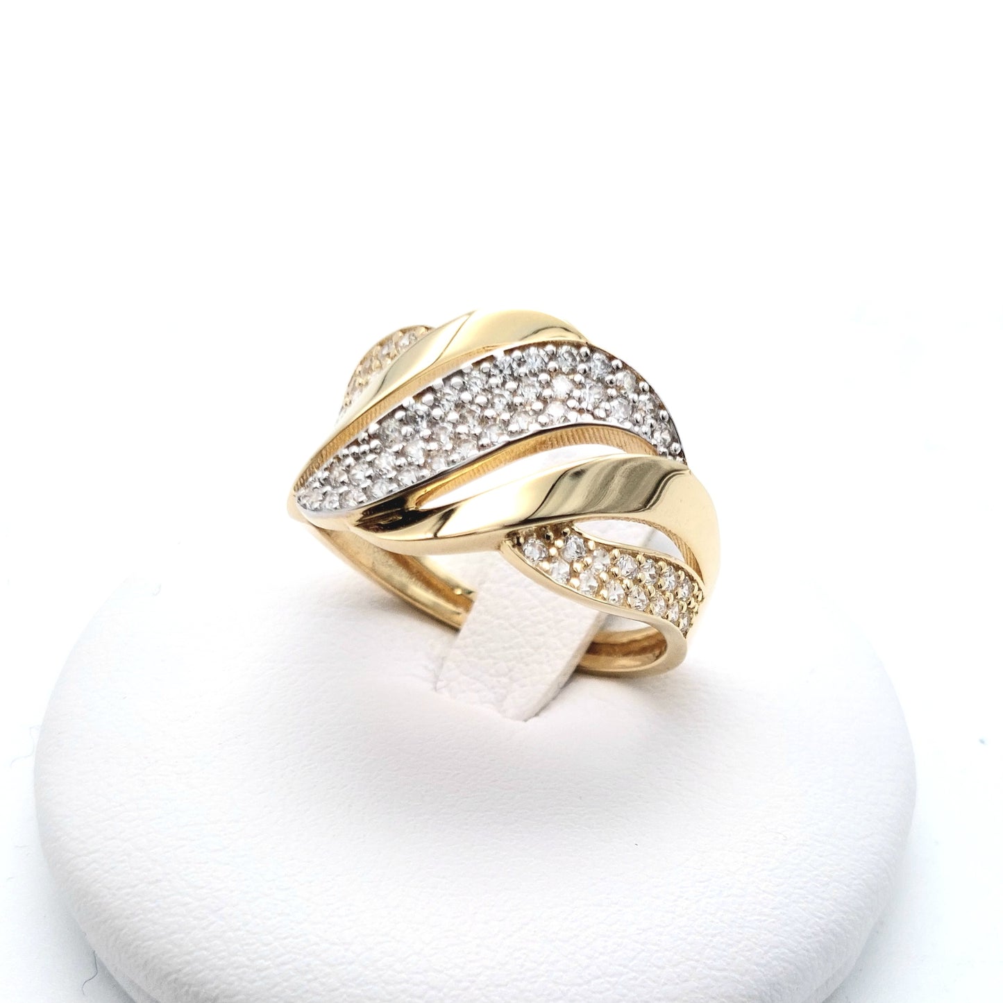 Anello in oro giallo e bianco 18 KT con zirconi bianchi. AN-ORO084.