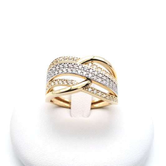 Anello in oro giallo e bianco 18 KT con zirconi bianchi. AN-ORO079.