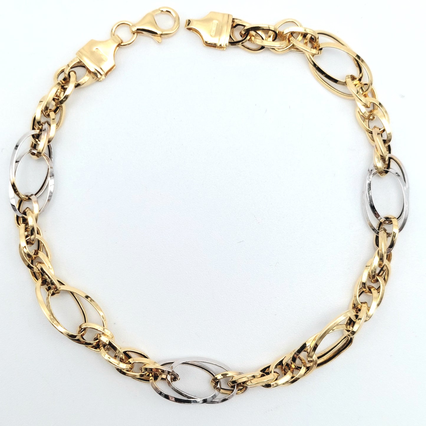 Bracciale da donna a catena in oro  giallo e bianco 18 KT. BR-D-ORO040.