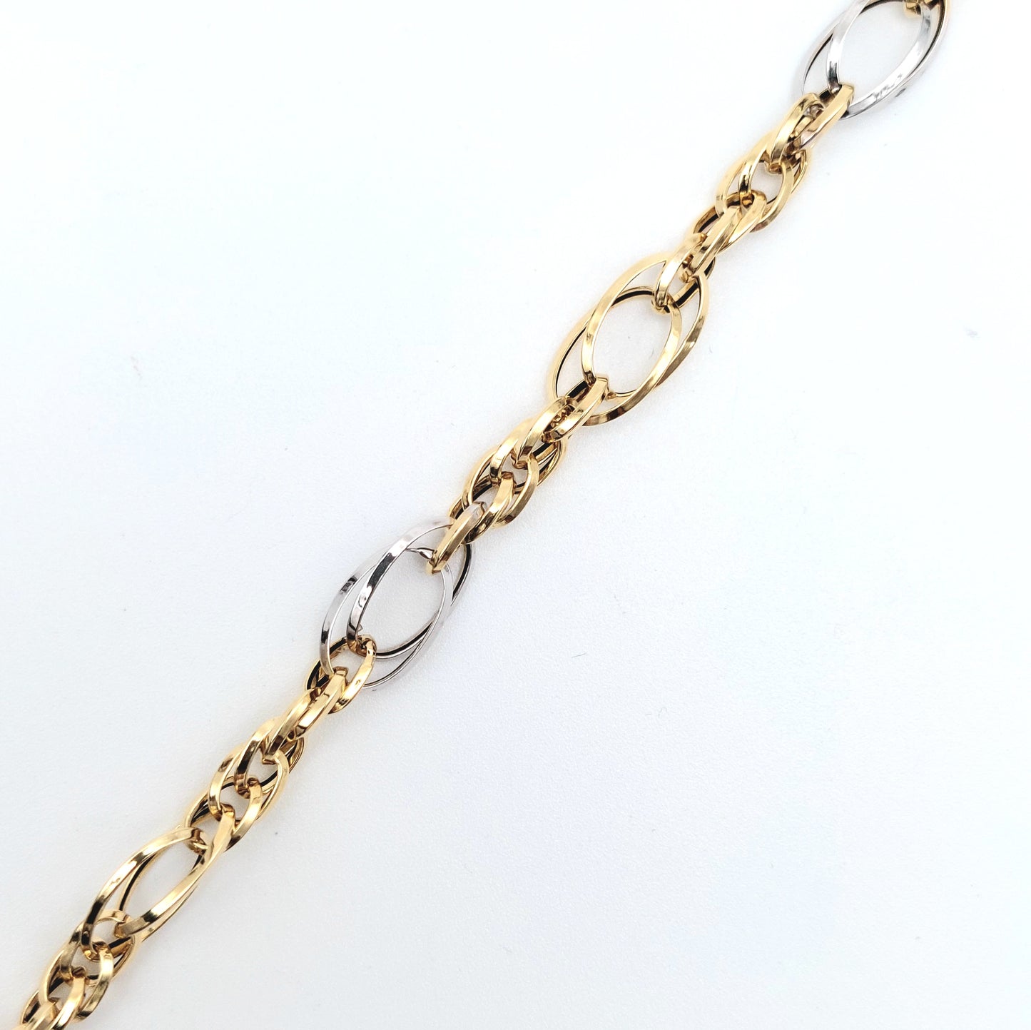 Bracciale da donna a catena in oro  giallo e bianco 18 KT. BR-D-ORO040.