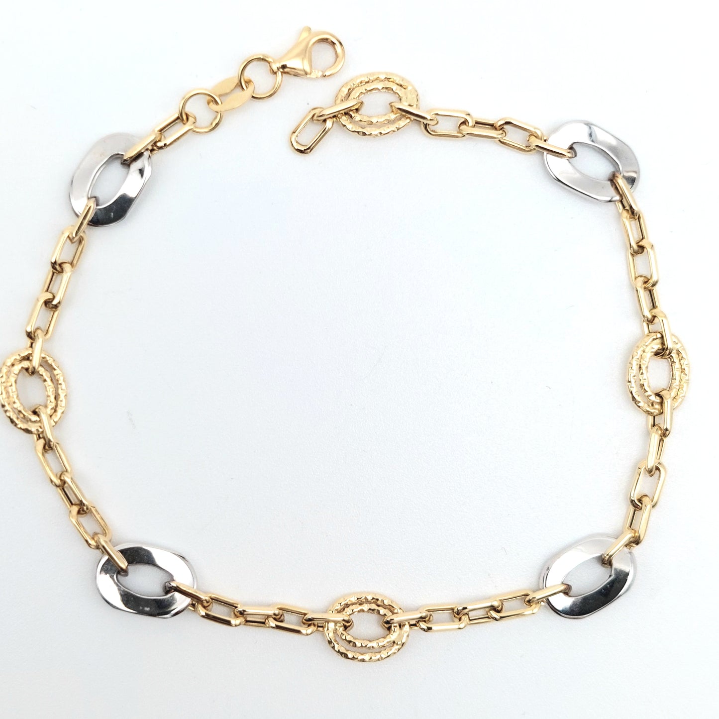 Bracciale da donna a catena in oro giallo e bianco 18 KT. BR-D-ORO042.