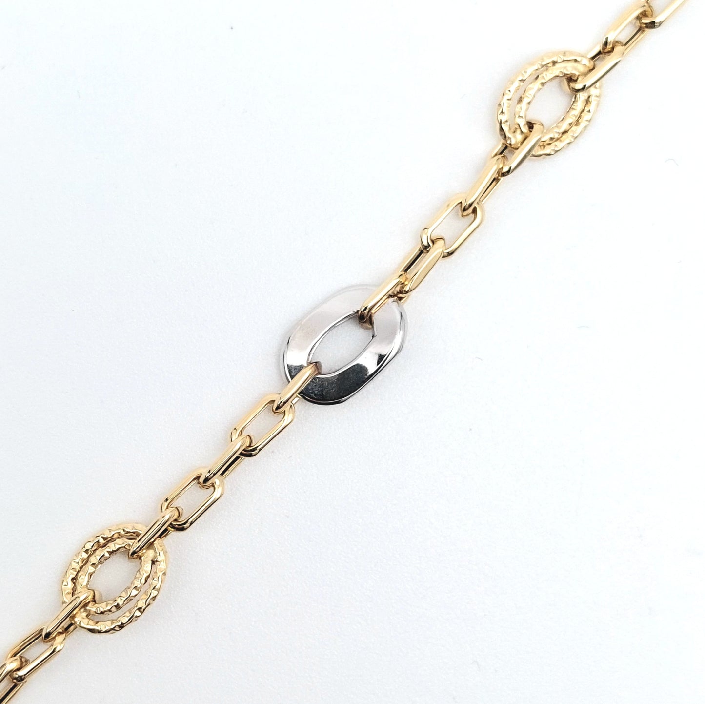 Bracciale da donna a catena in oro giallo e bianco 18 KT. BR-D-ORO042.