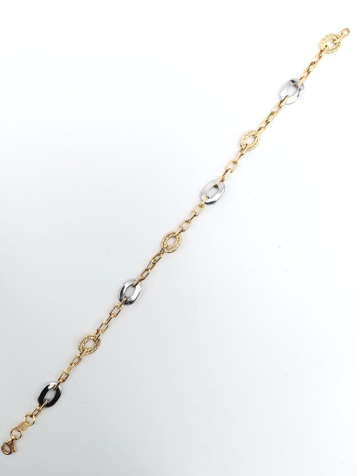 Bracciale da donna a catena in oro giallo e bianco 18 KT. BR-D-ORO042.