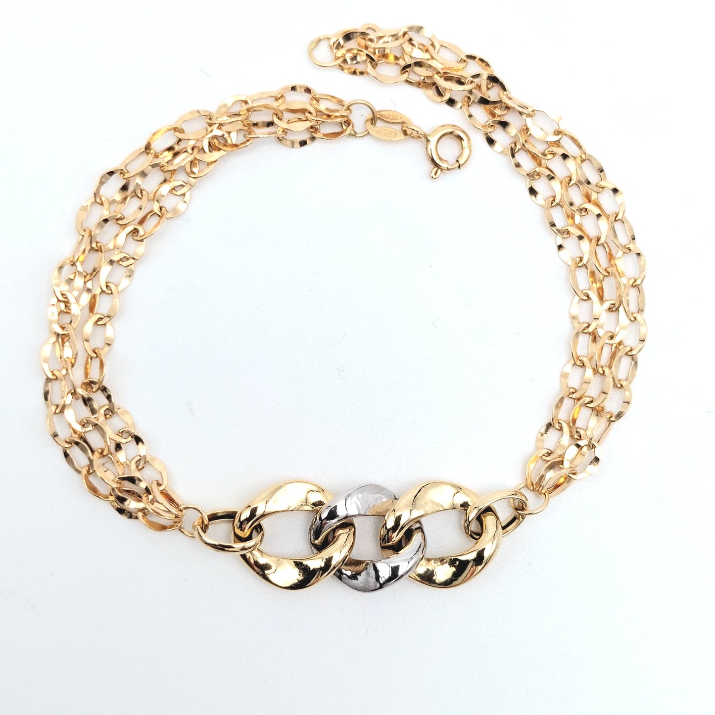 Bracciale a catena da donna in oro giallo e bianco 18 KT. BR-D-ORO047.