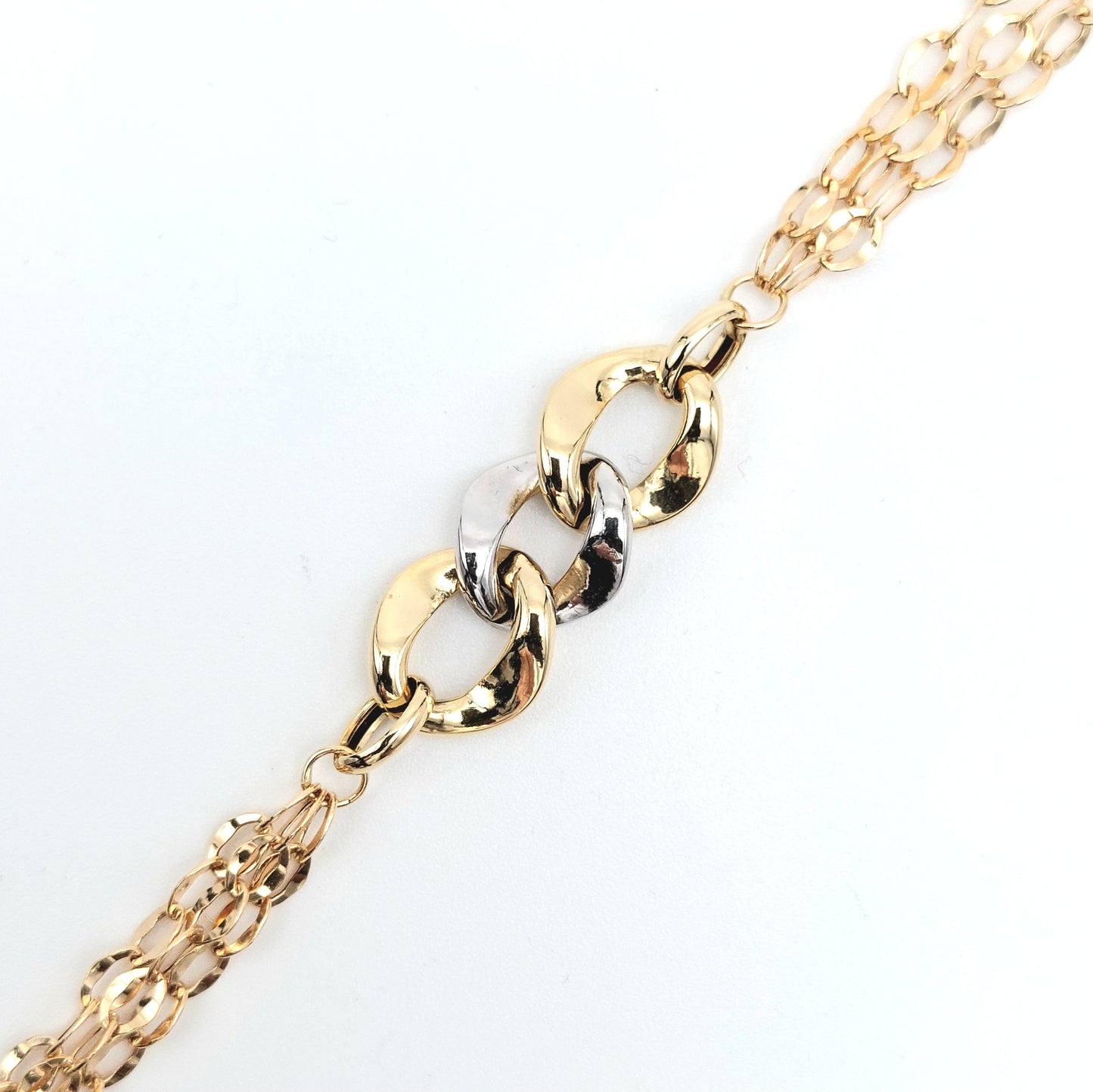 Bracciale a catena da donna in oro giallo e bianco 18 KT. BR-D-ORO047.