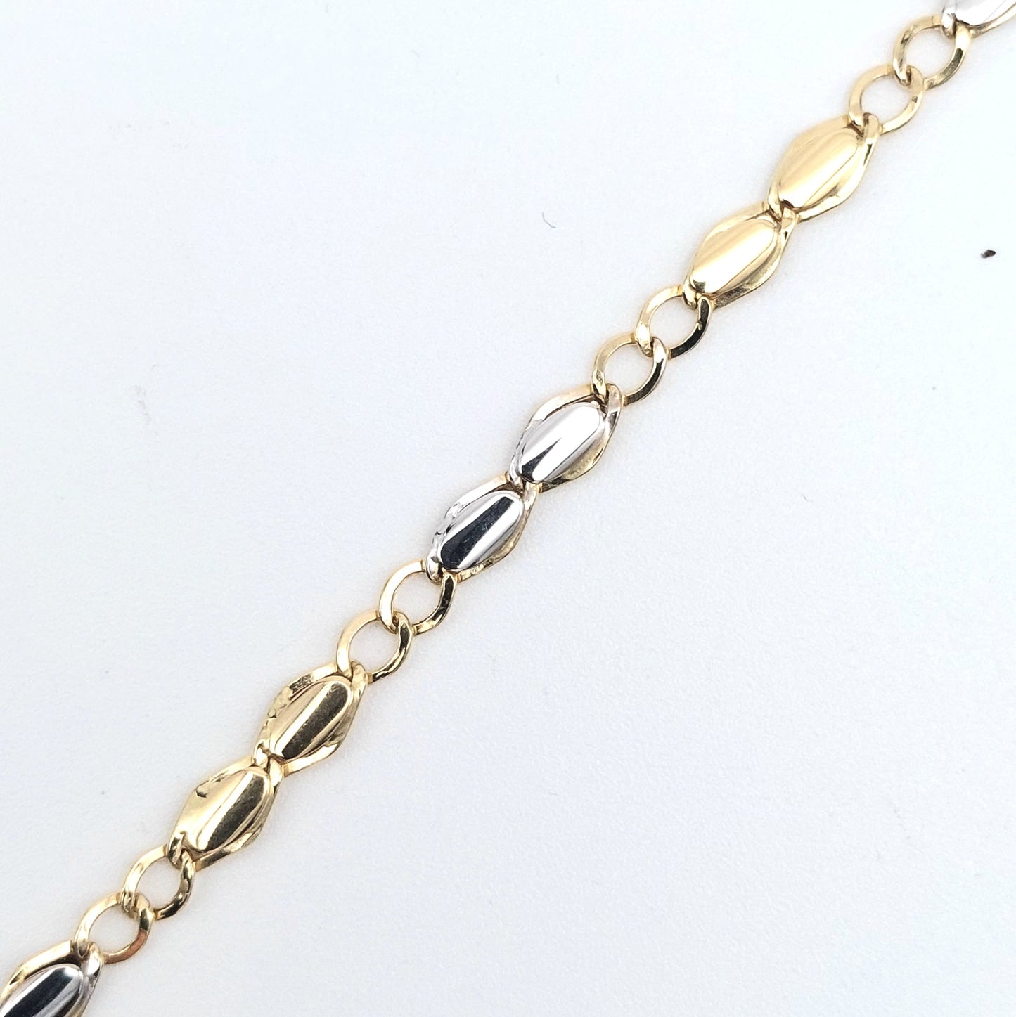 Bracciale da uomo in oro giallo e bianco 18 kt. BR-U-ORO007.