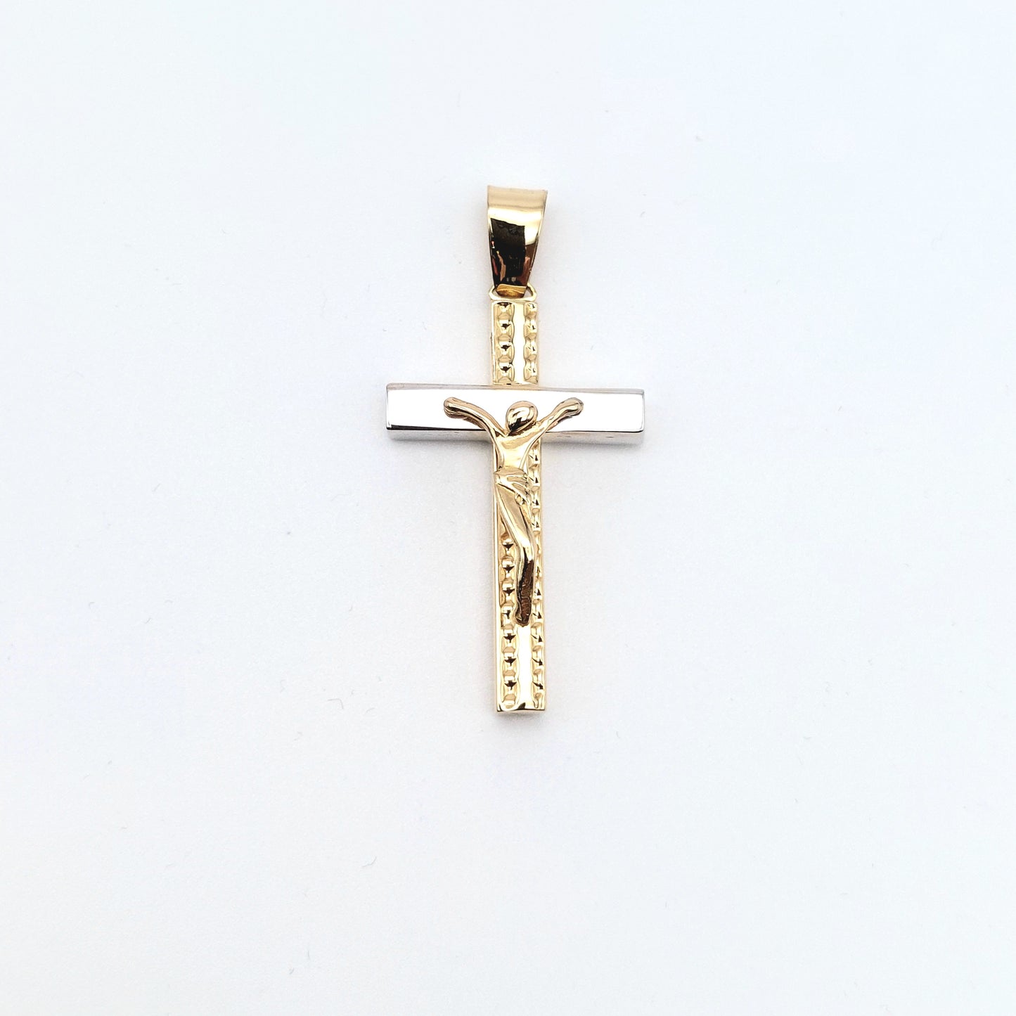 Croce in oro giallo e bianco 18 kt. CR-ORO004.