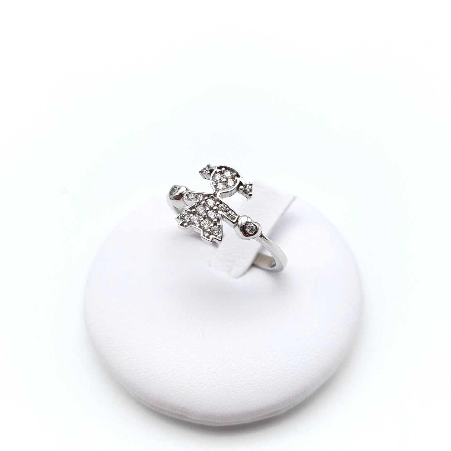 Anello bimba  in oro bianco 18 KT, con zirconi bianchi . AN-ORO035.