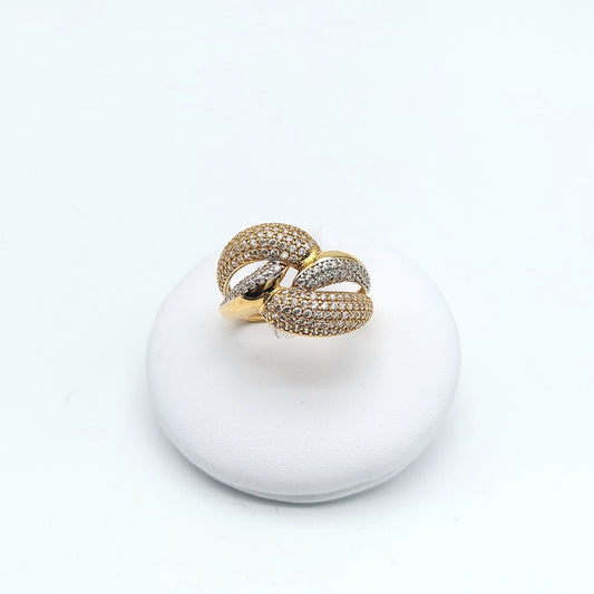 Anello in oro bicolore 18 kt con zirconi. AN-ORO003.