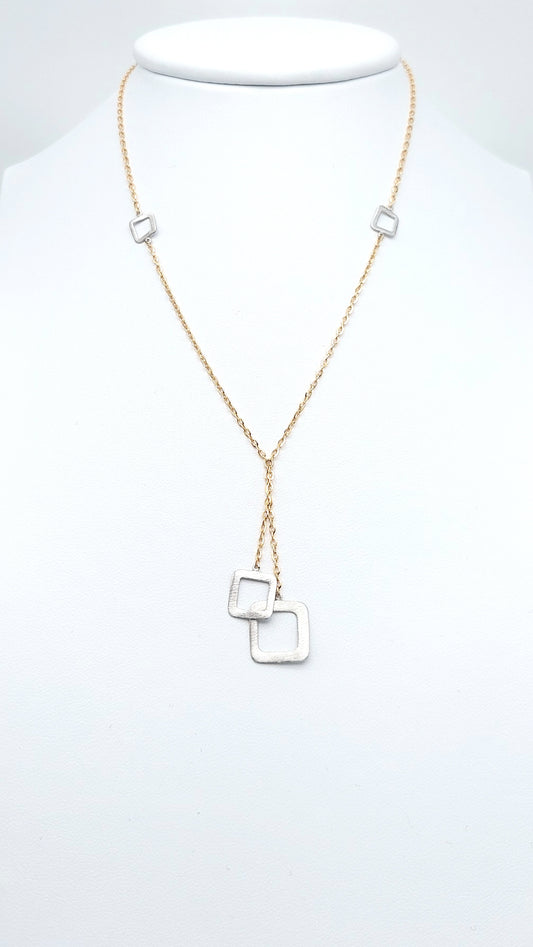 Collana a catena con elementi  in oro giallo e bianco 18 KT. COL-D-ORO004.