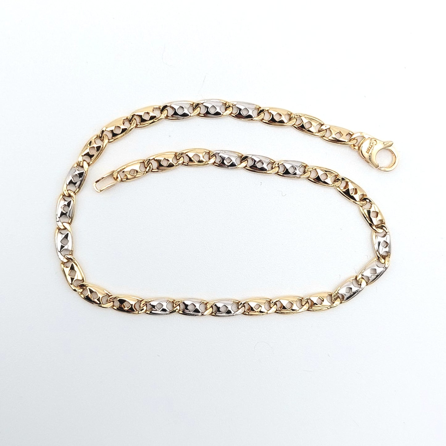 Bracciale uomo in oro giallo e bianco 18 kt. BR-U-ORO002.