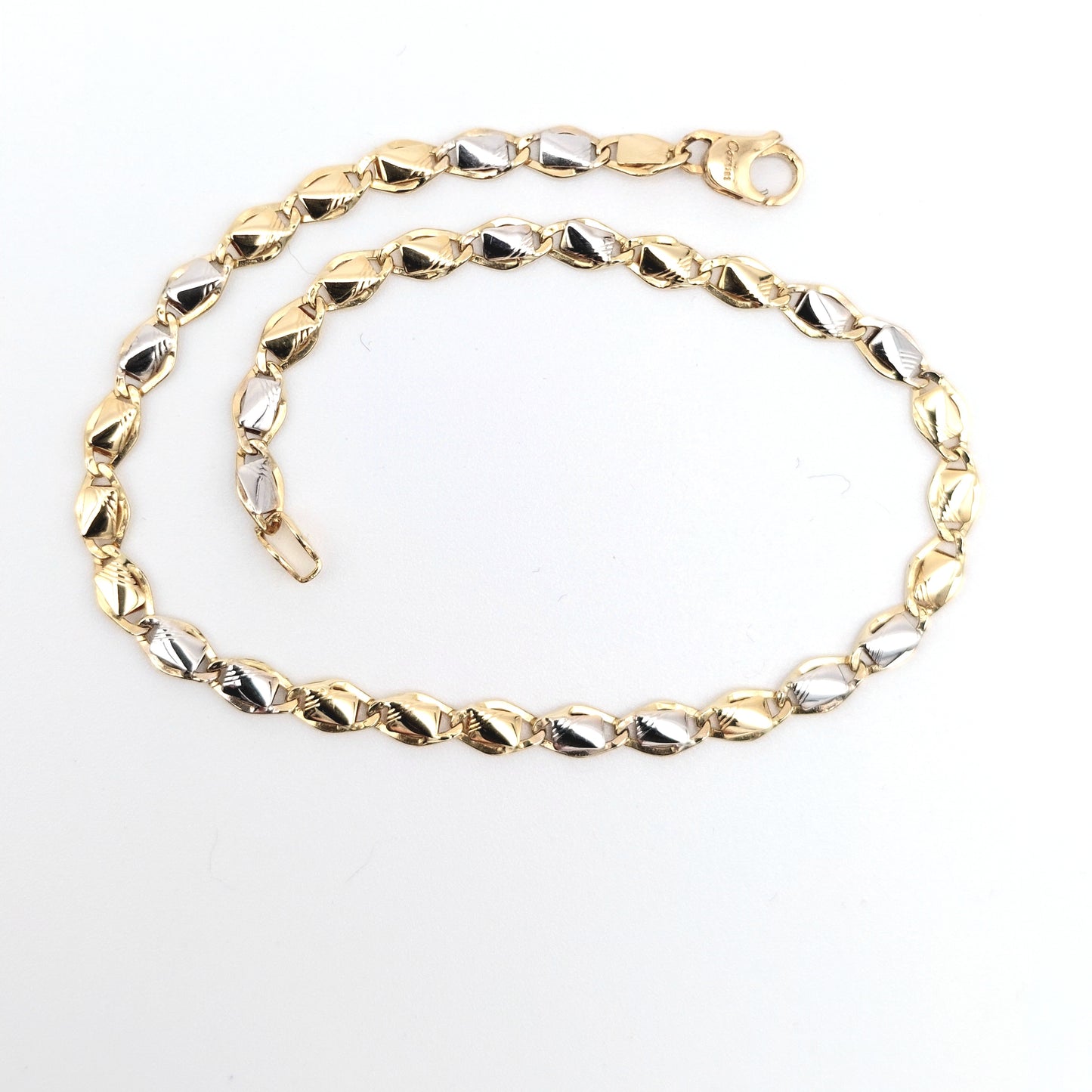 Bracciale da uomo in oro giallo e bianco 18 kt. BR-U-ORO003.